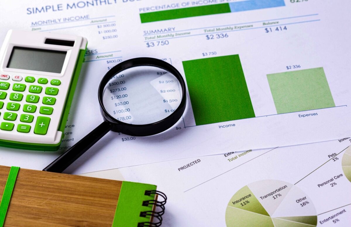 calculator-magnifying-glass-table